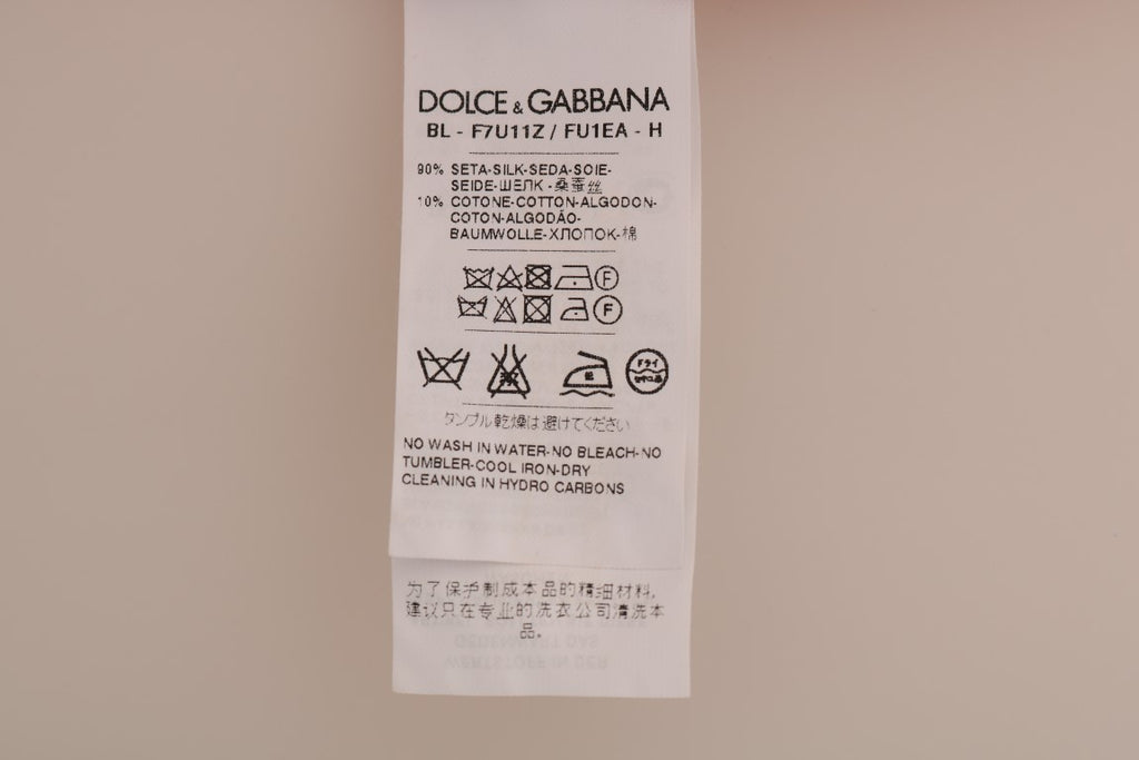 Vase en cristal rouge en soie orange de Dolce & Gabbana, décoration élégante avec finition raffinée.