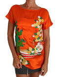 T-shirt en soie orange de Dolce & Gabbana avec motifs citron et cristaux, style élégant et coloré.