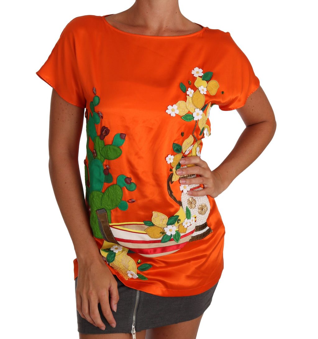 T-shirt en soie Dolce & Gabbana orange avec motif citron et cristaux, coupe ajustée, vue de face.