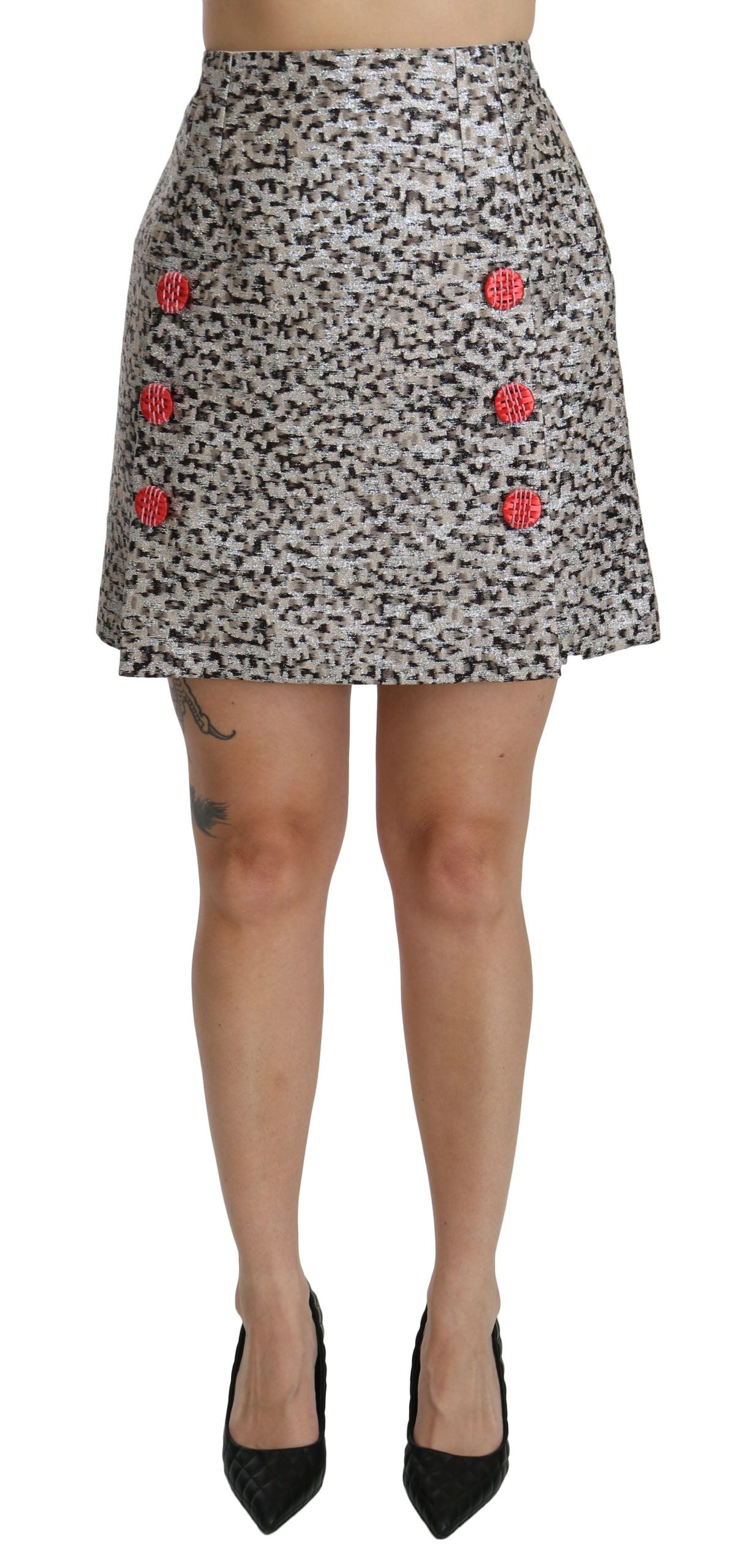 Jupe longue en métal argenté à motif Dolce & Gabbana, coupe évasée à taille haute élégante et sophistiquée.