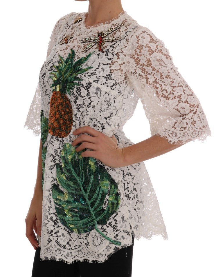 Blouse en dentelle blanche Dolce & Gabbana ornée de cristaux, élégante et raffinée, vue de face sur fond neutre.