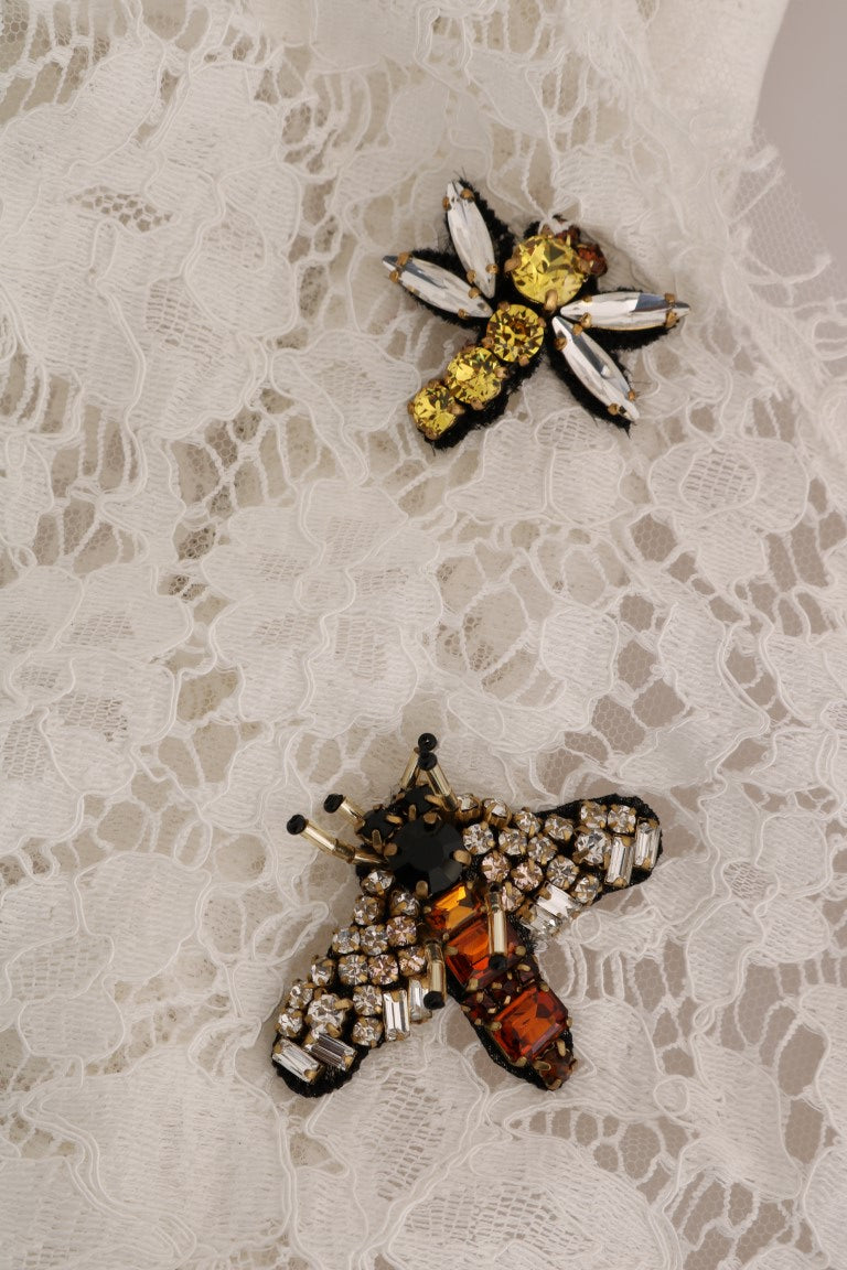 Blouse en dentelle blanche Dolce & Gabbana ornée de cristaux, élégante et raffinée, vue de face.