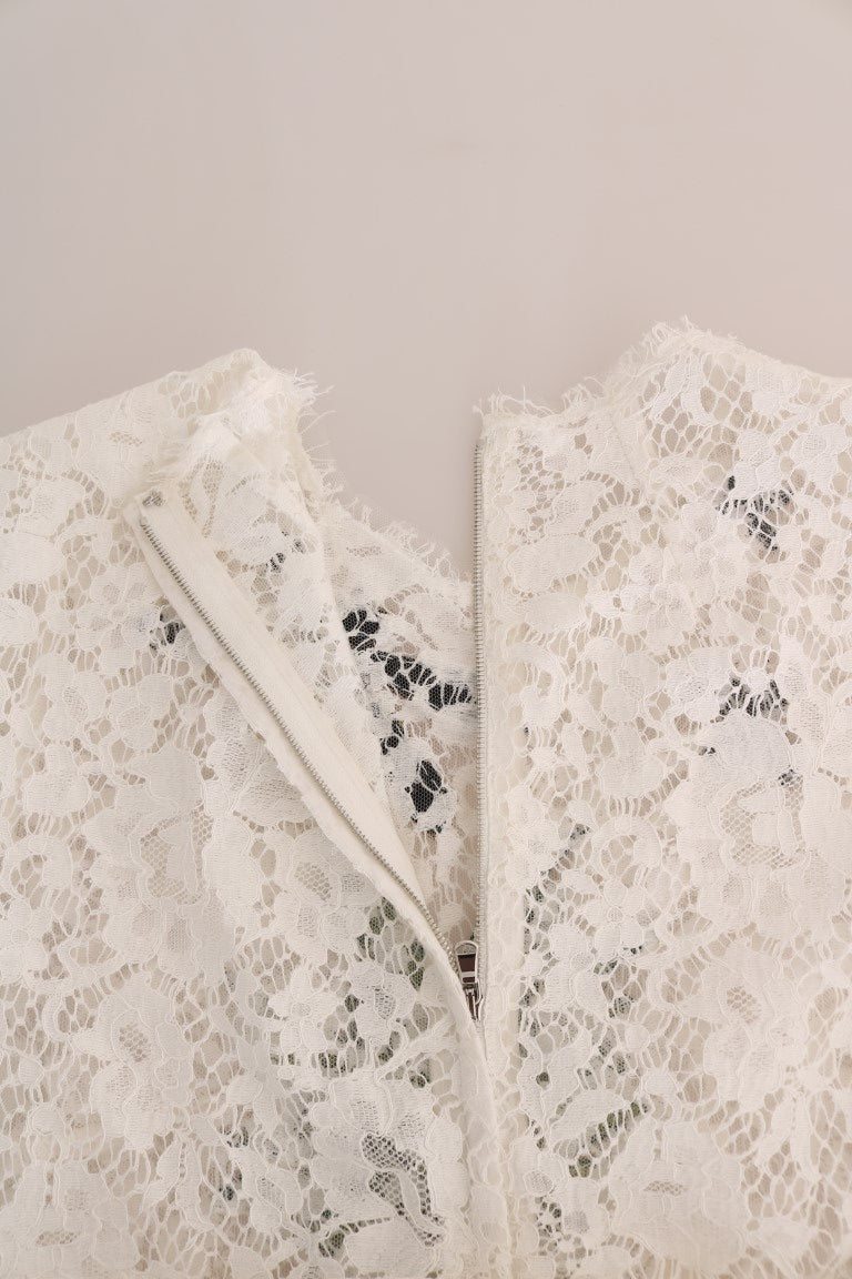 Blouse en dentelle blanche Dolce & Gabbana ornée de cristaux, élégante et raffinée, vue de face.