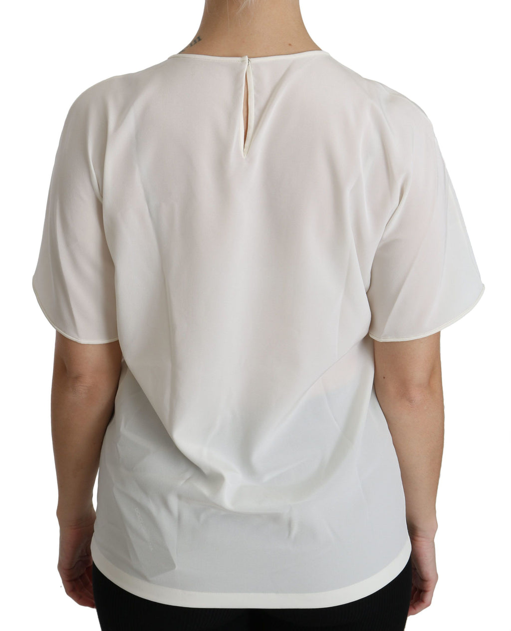 Chemise à manches courtes Dolce & Gabbana #dgfamily blanche avec patch, style élégant et décontracté visible sur cette image.