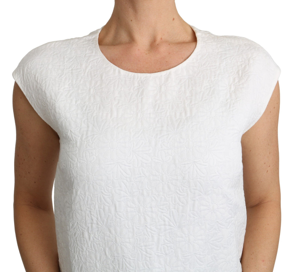 Chemisier blanc en brocart floral en coton de Dolce & Gabbana, détail élégant avec motifs floraux.