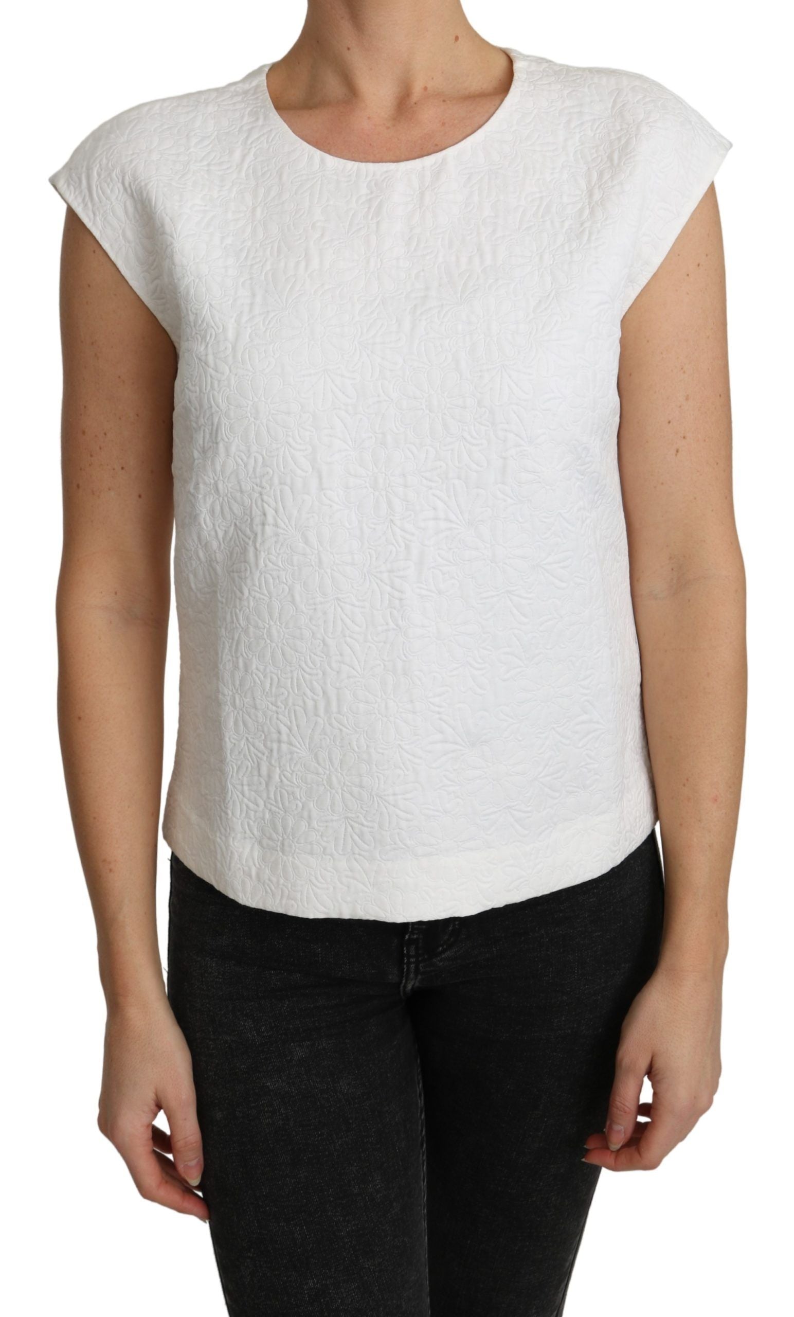 Blouse en brocart floral blanche de Dolce & Gabbana en coton, élégante et sophistiquée, portée sur un mannequin.