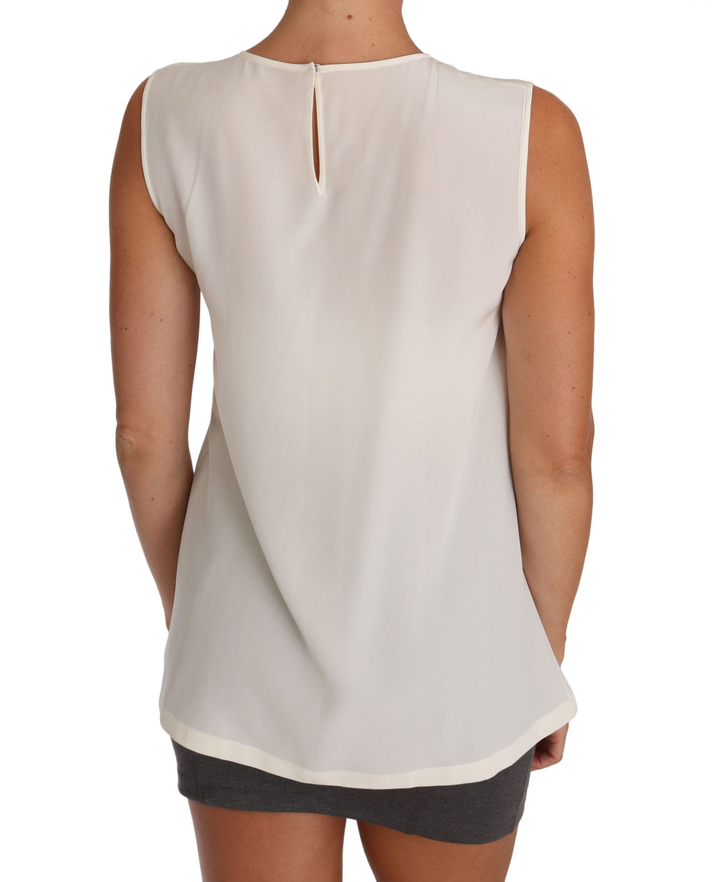 T-shirt blanc en soie Dolce & Gabbana avec sequins et détails de fée, élégante et ornée de cristaux.