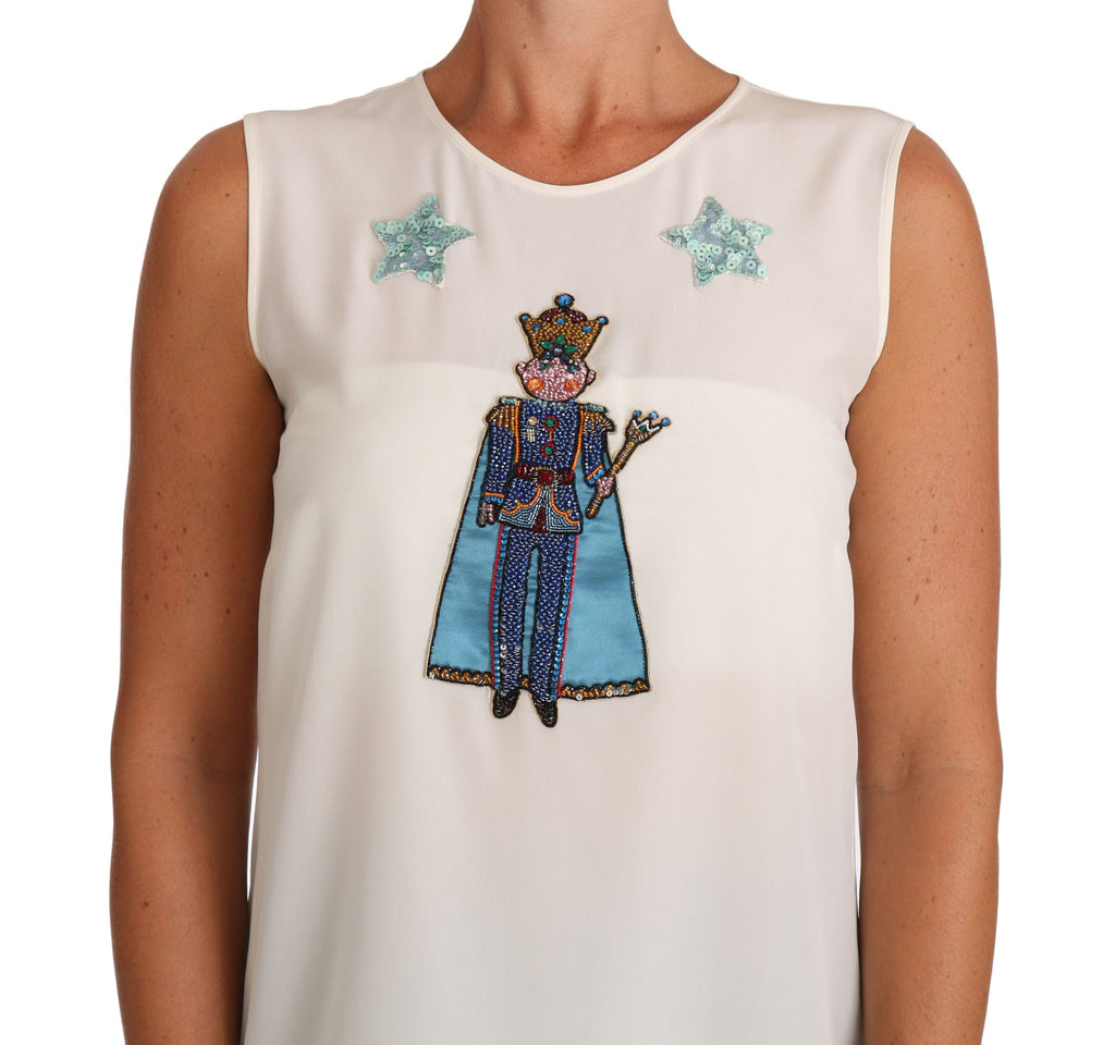 T-shirt blanc en soie Dolce & Gabbana avec sequins et détails cristallins, style fairy élégant et féminin.