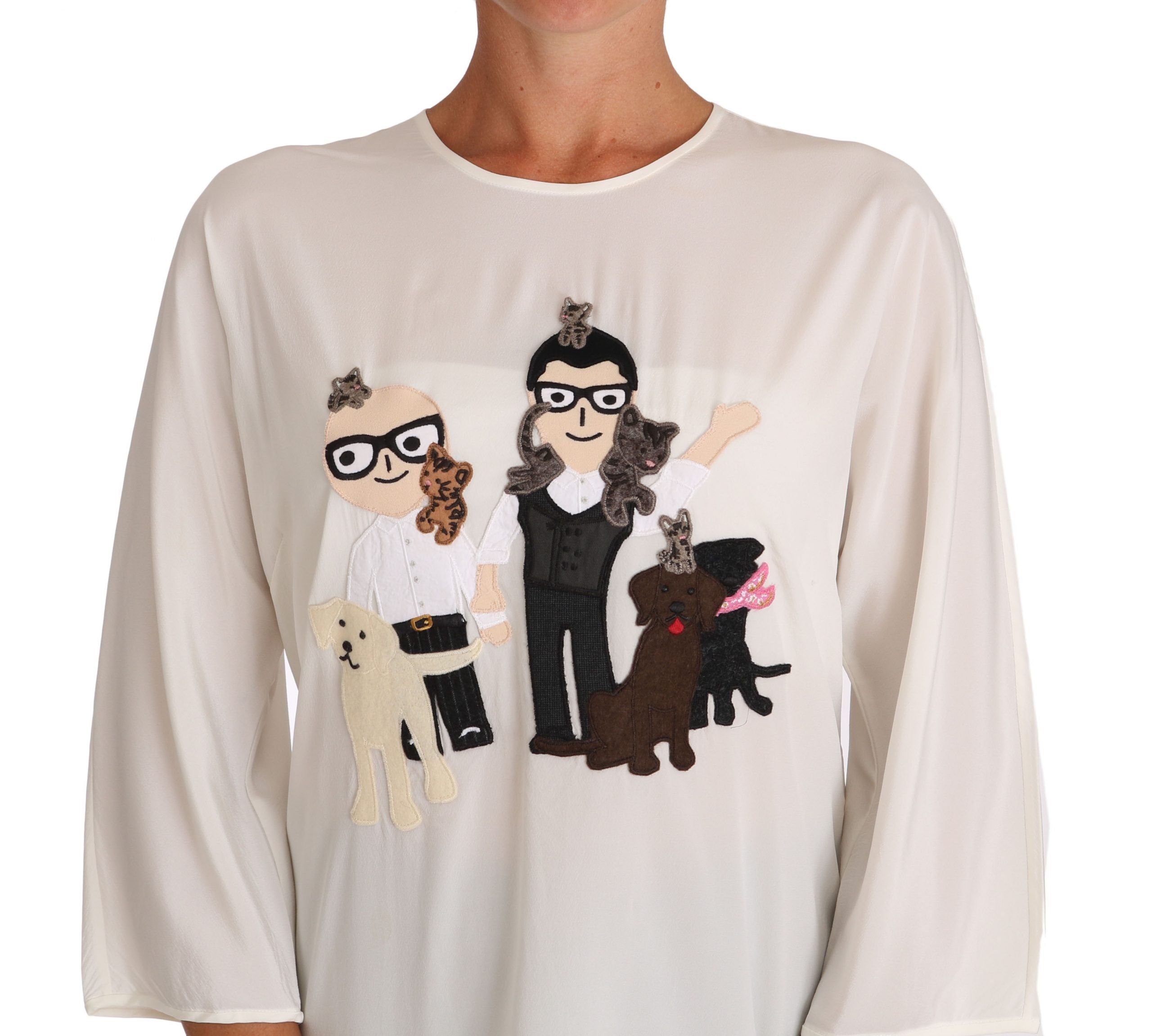 Blouse en soie blanche Dolce & Gabbana #dgfamily avec col en V et manches longues, élégante et raffinée.