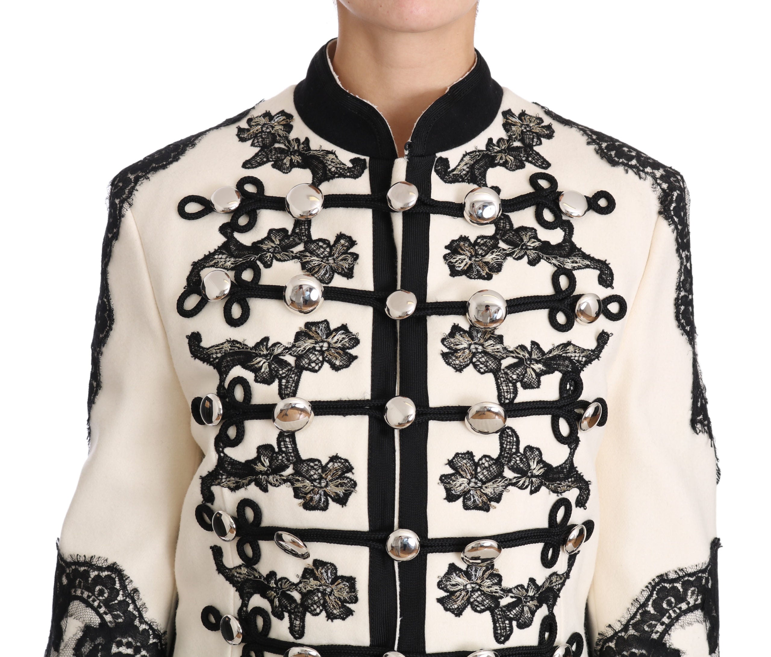 Veste baroque en laine blanche et noire de Dolce & Gabbana avec motifs floraux et détails élégants.