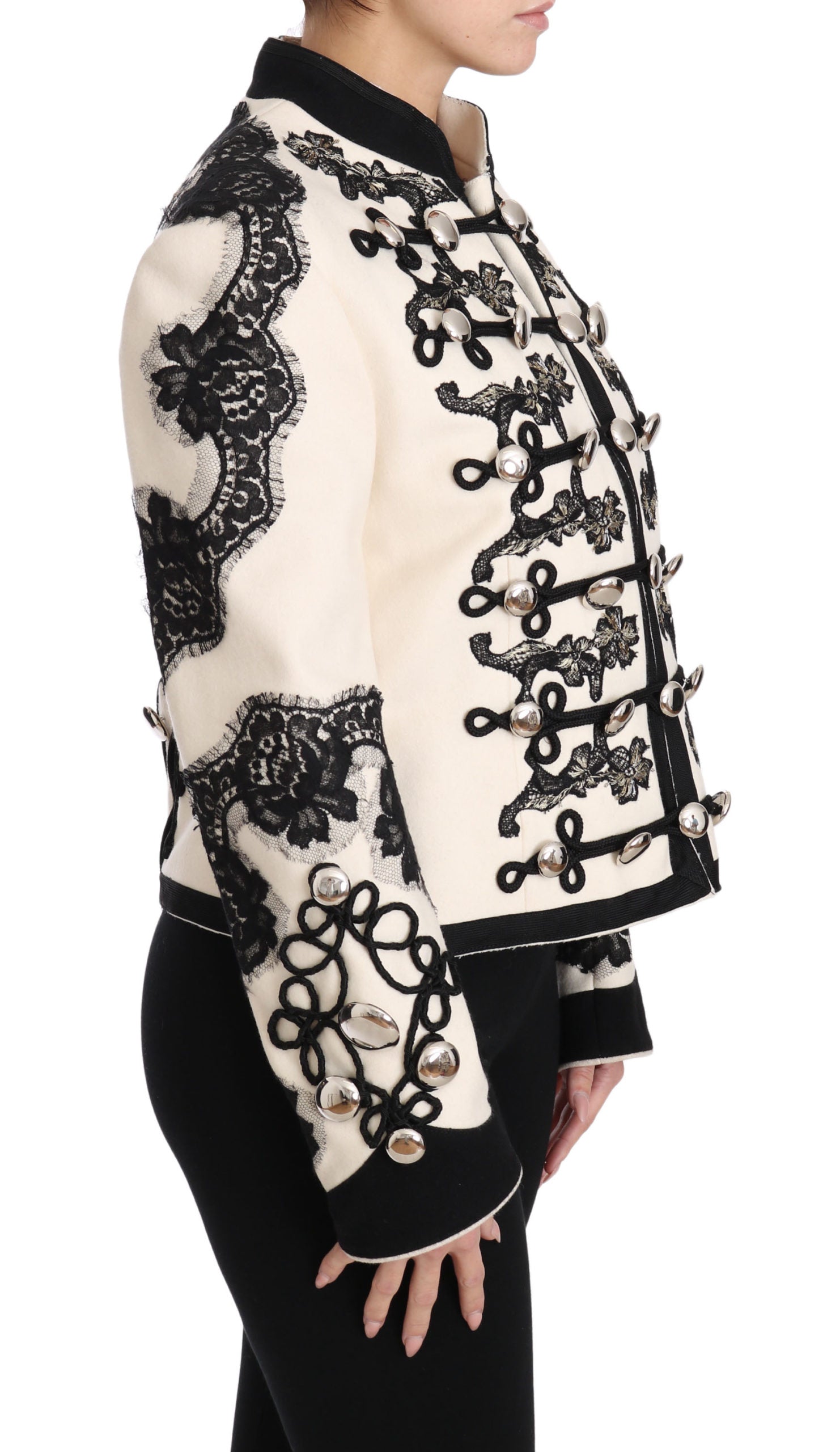 Veste en laine blanche Dolce & Gabbana avec motif floral baroque noir, élégante et sophistiquée.