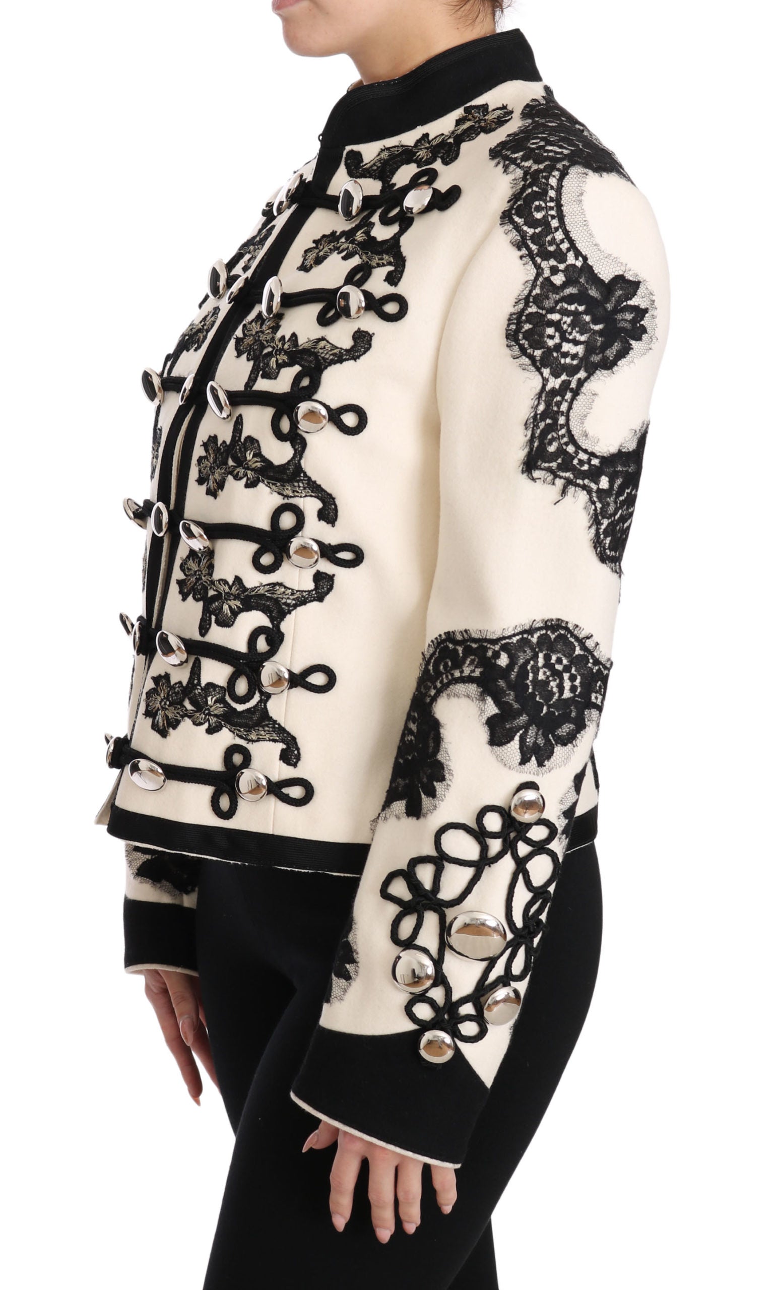 Veste baroque en laine blanche et noire de Dolce & Gabbana avec motifs floraux et détails élégants.