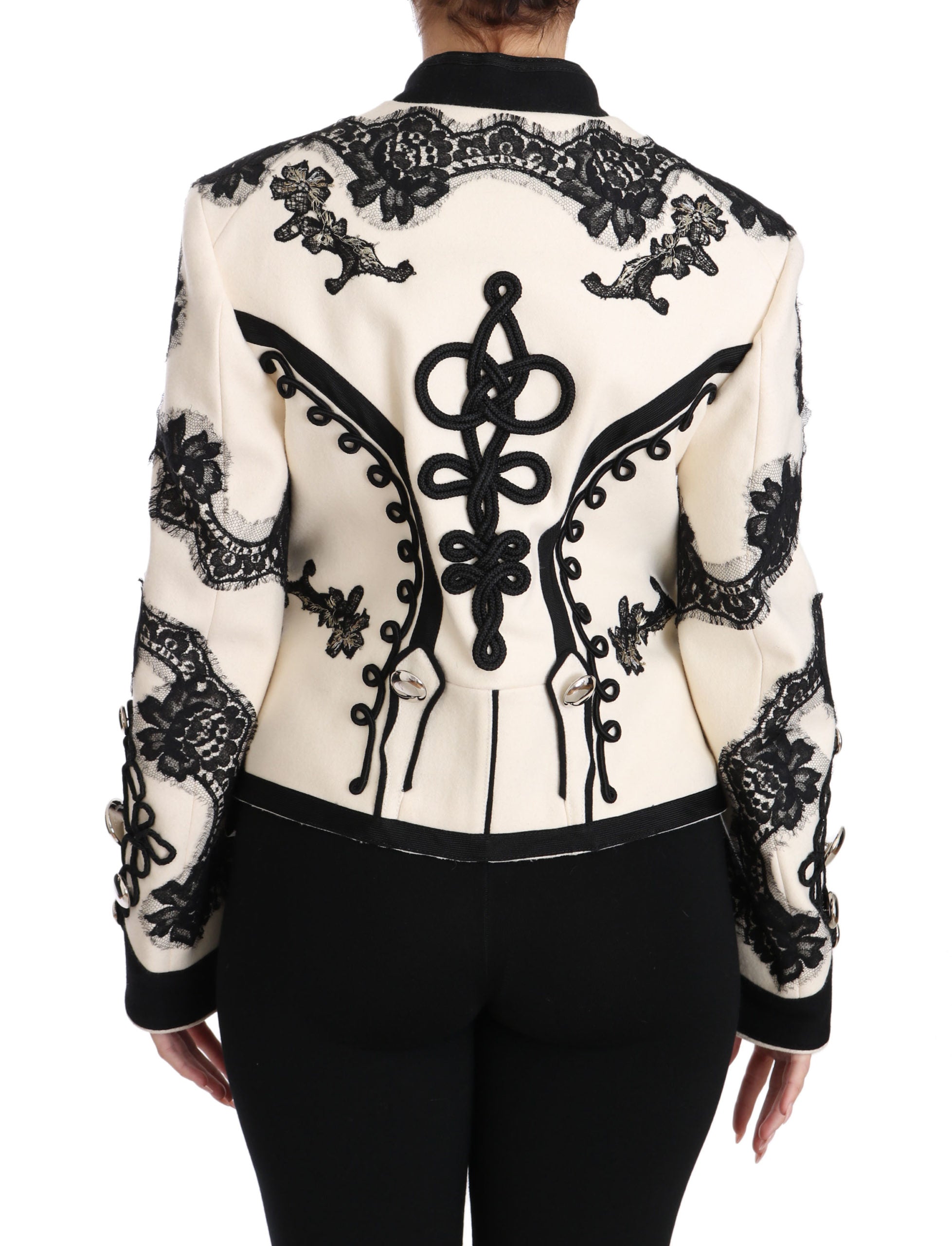 Veste baroque blanche en laine noire avec motifs floraux de Dolce & Gabbana, style élégant et sophistiqué.