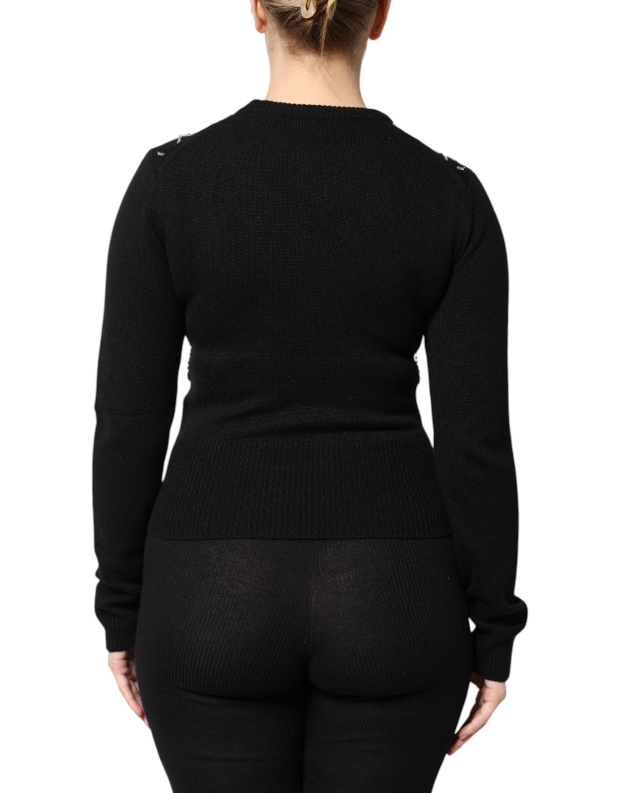 Haut noir en cachemire Dolce & Gabbana à manches longues avec embellissements élégants, vue de face.