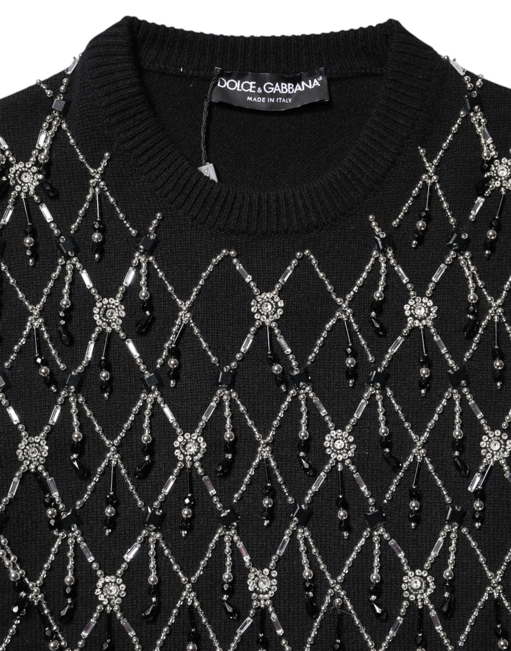 Pull noir en cachemire Dolce & Gabbana à manches longues avec embellissements, élégant et confortable.