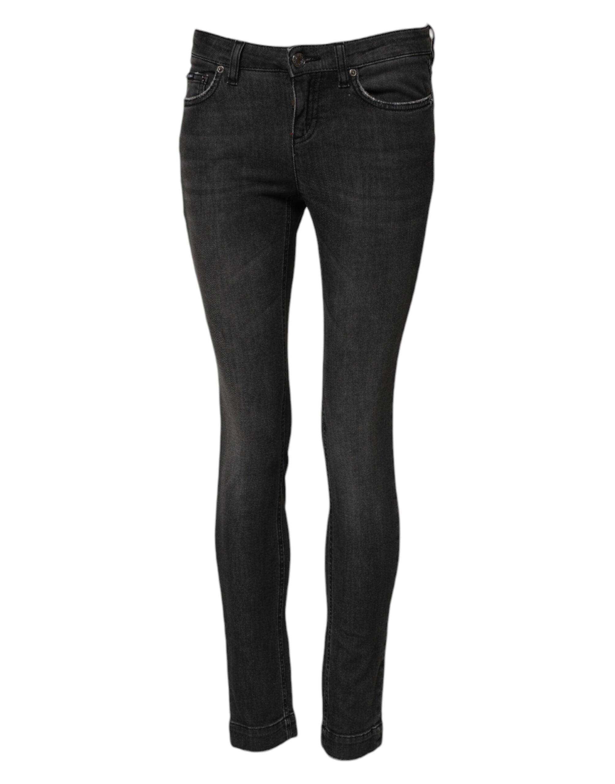 Jeans skinny en coton noir à taille basse de Dolce & Gabbana, coupe ajustée et style élégant, vue de face.