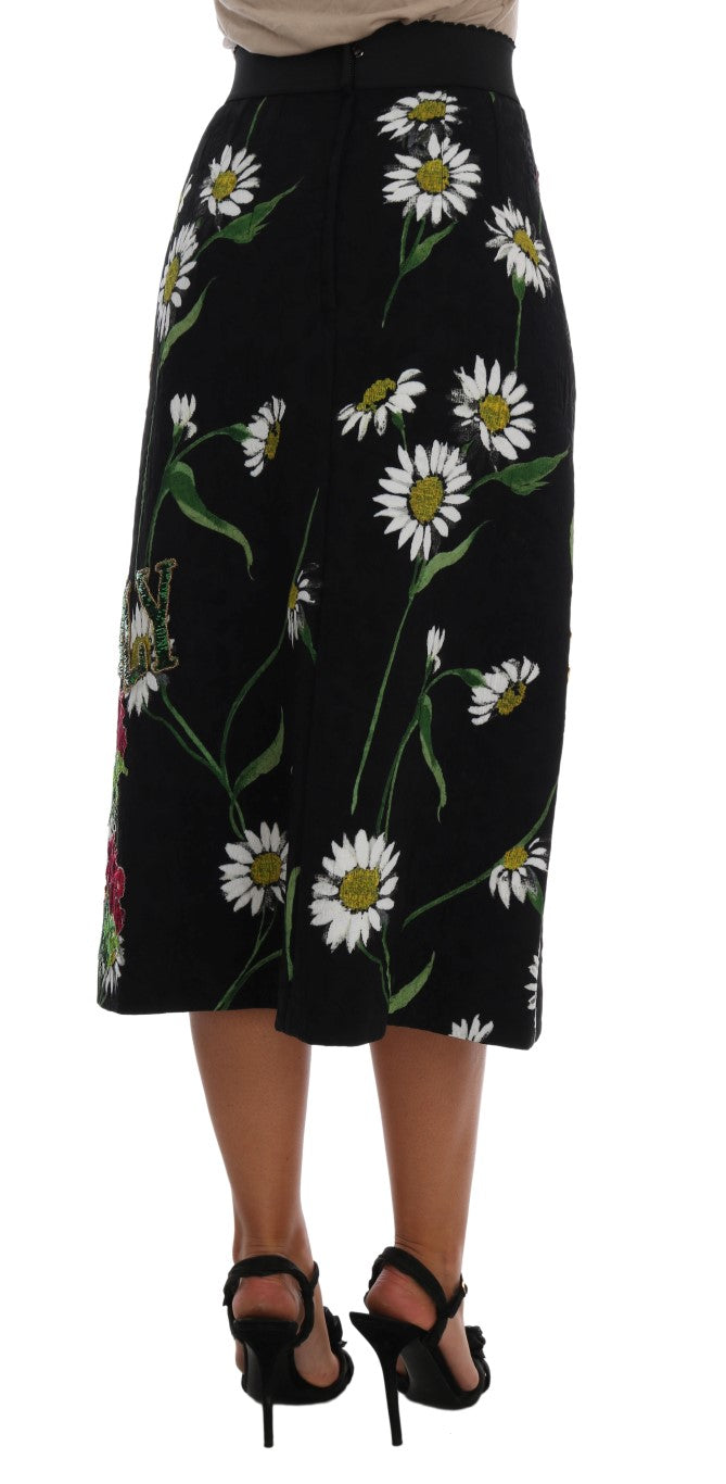 Jupe Dolce & Gabbana en brocart noir avec embellissements de marguerite, élégante et sophistiquée.