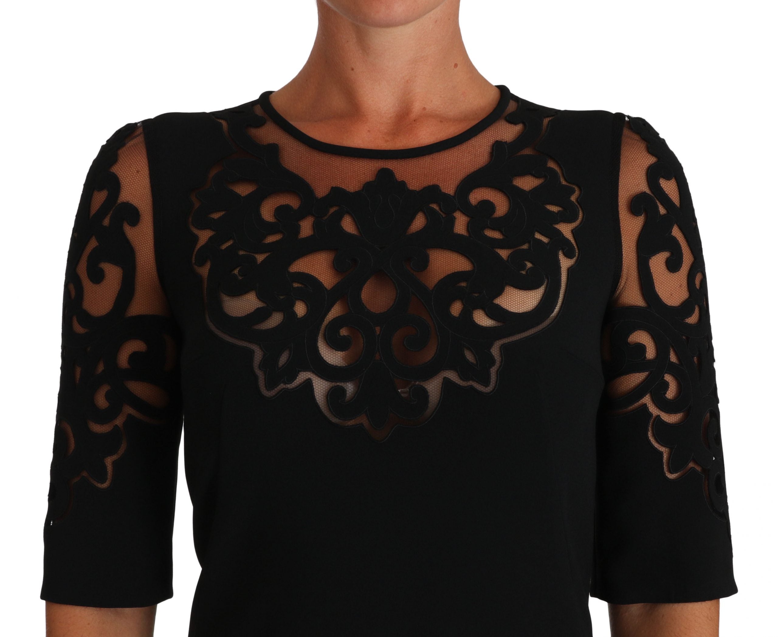 Robe de cocktail noire Dolce & Gabbana avec motif floral découpé et design élégant, vue de face.
