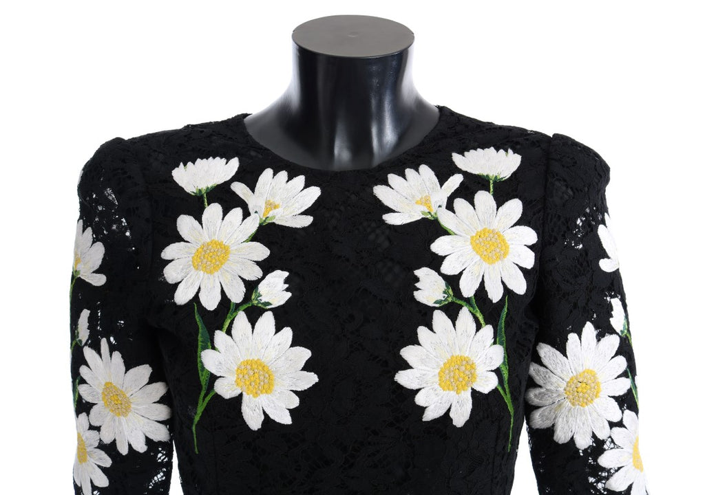 Robe Dolce & Gabbana noire à fleurs en dentelle Chamomile Sicily, silhouette élégante et détails floraux sophistiqués.