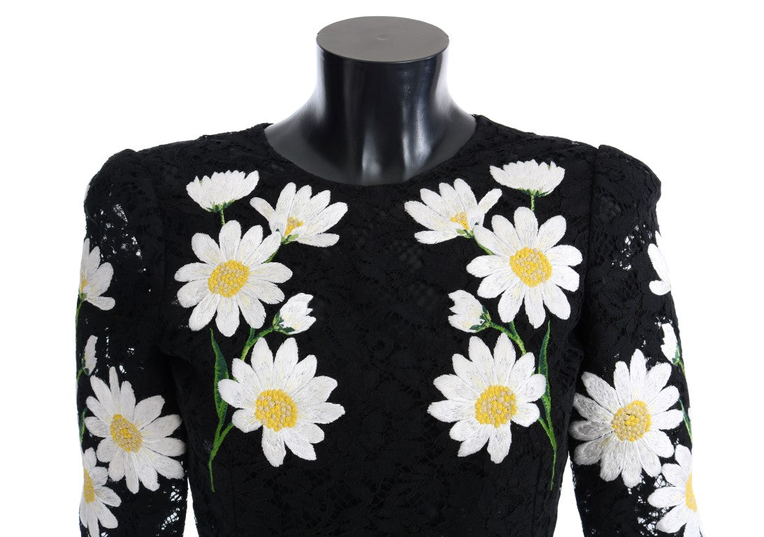 Robe Dolce & Gabbana noire à fleurs en dentelle Chamomile Sicily, silhouette élégante et détails floraux sophistiqués.