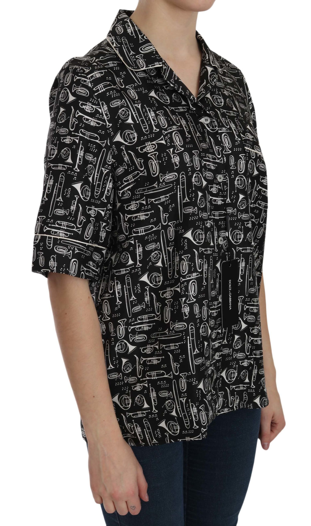 Haut en soie noir Dolce & Gabbana avec imprimé d'instruments de musique, style élégant et tendance.