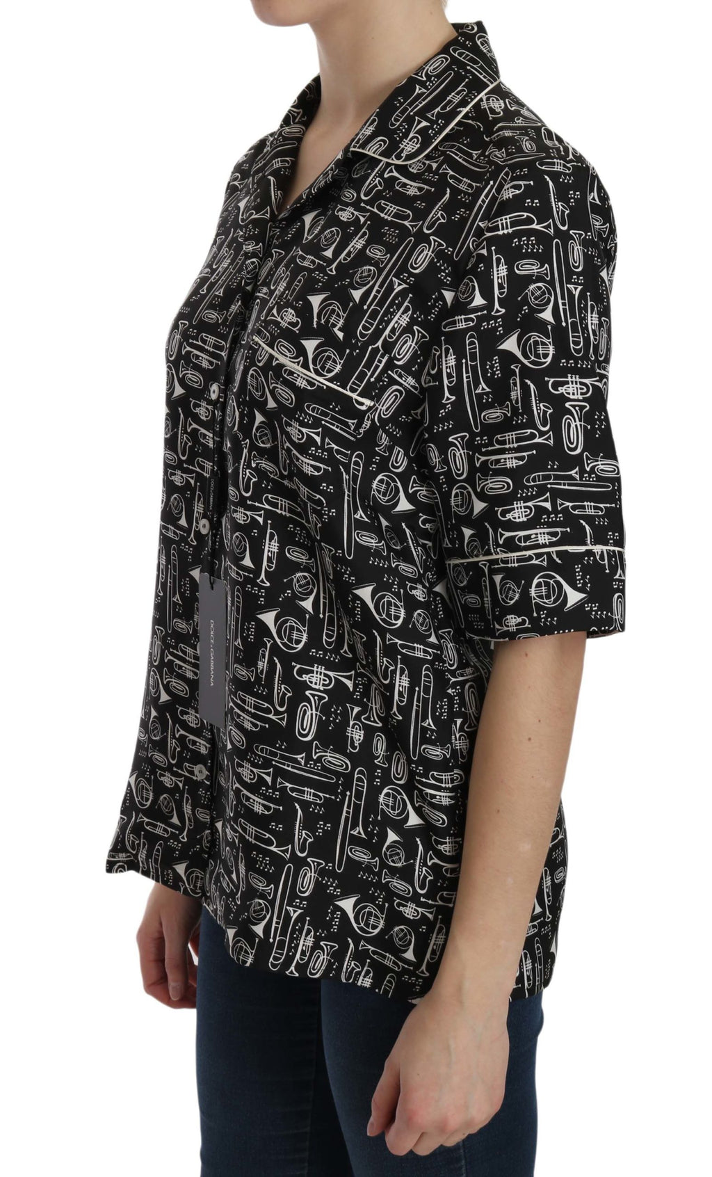 Chemisier en soie noir avec imprimé d'instruments de musique Dolce & Gabbana, style élégant et moderne.