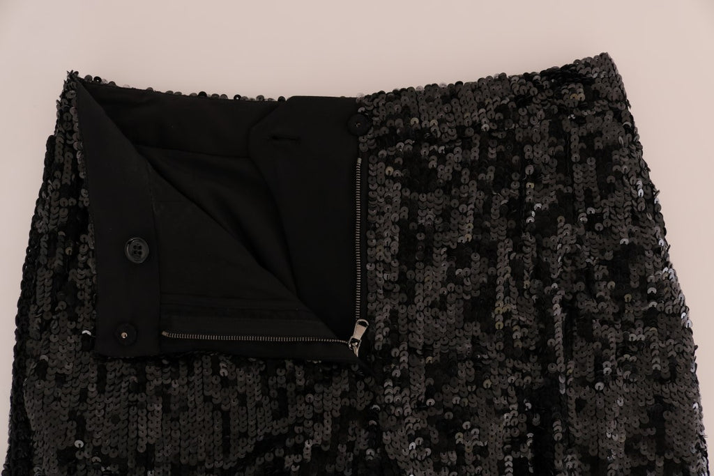 Shorts de mode noirs à sequins de Dolce & Gabbana, style élégant et brillant, avec détails scintillants visibles sur l'image.
