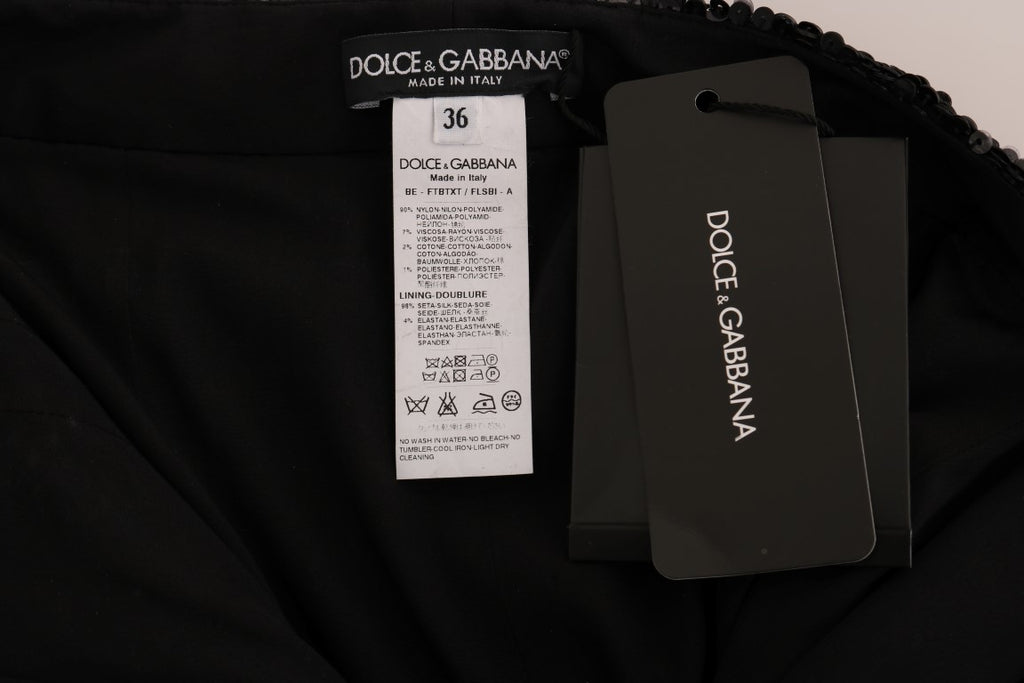 Shorts de mode noirs à sequins de Dolce & Gabbana, vêtement élégant avec détails brillants pour une allure sophistiquée.