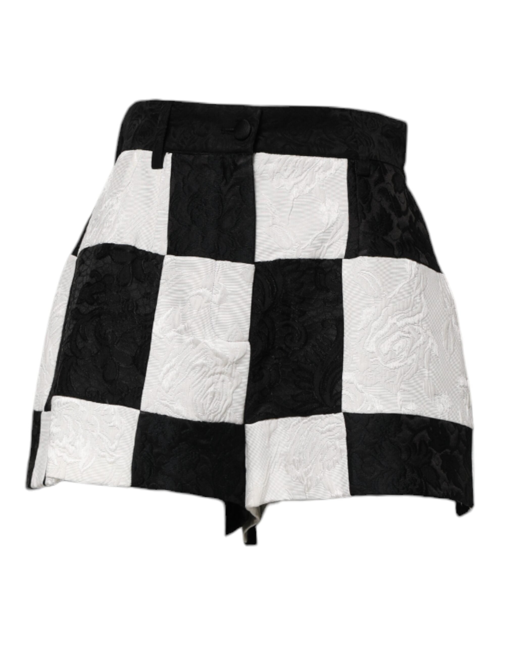 Shorts Dolce & Gabbana en brocart floral noir et blanc, style chaud, avec détails élégants et design tendance.