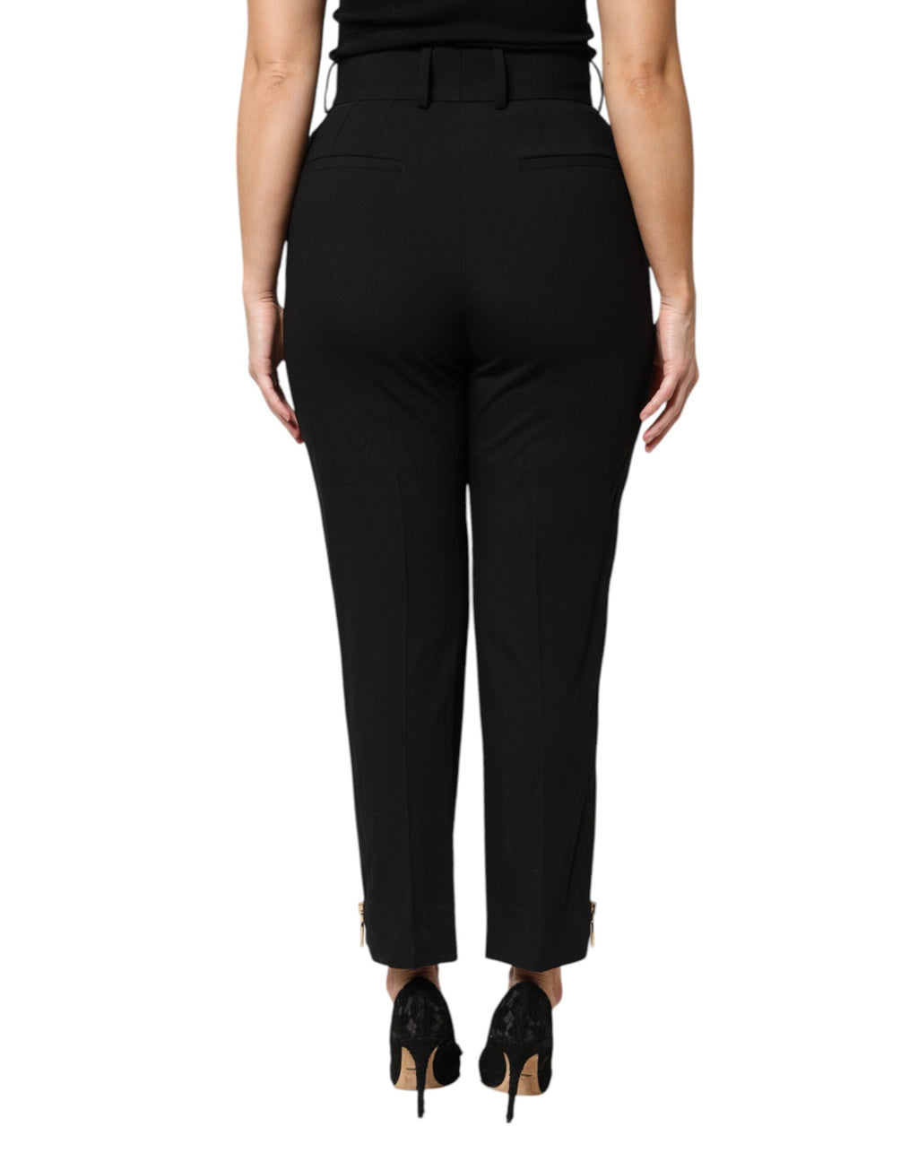 Pantalons en laine noire Dolce & Gabbana, taille haute, coupe tapered, avec fermeture éclair visible, mode élégante pour femmes