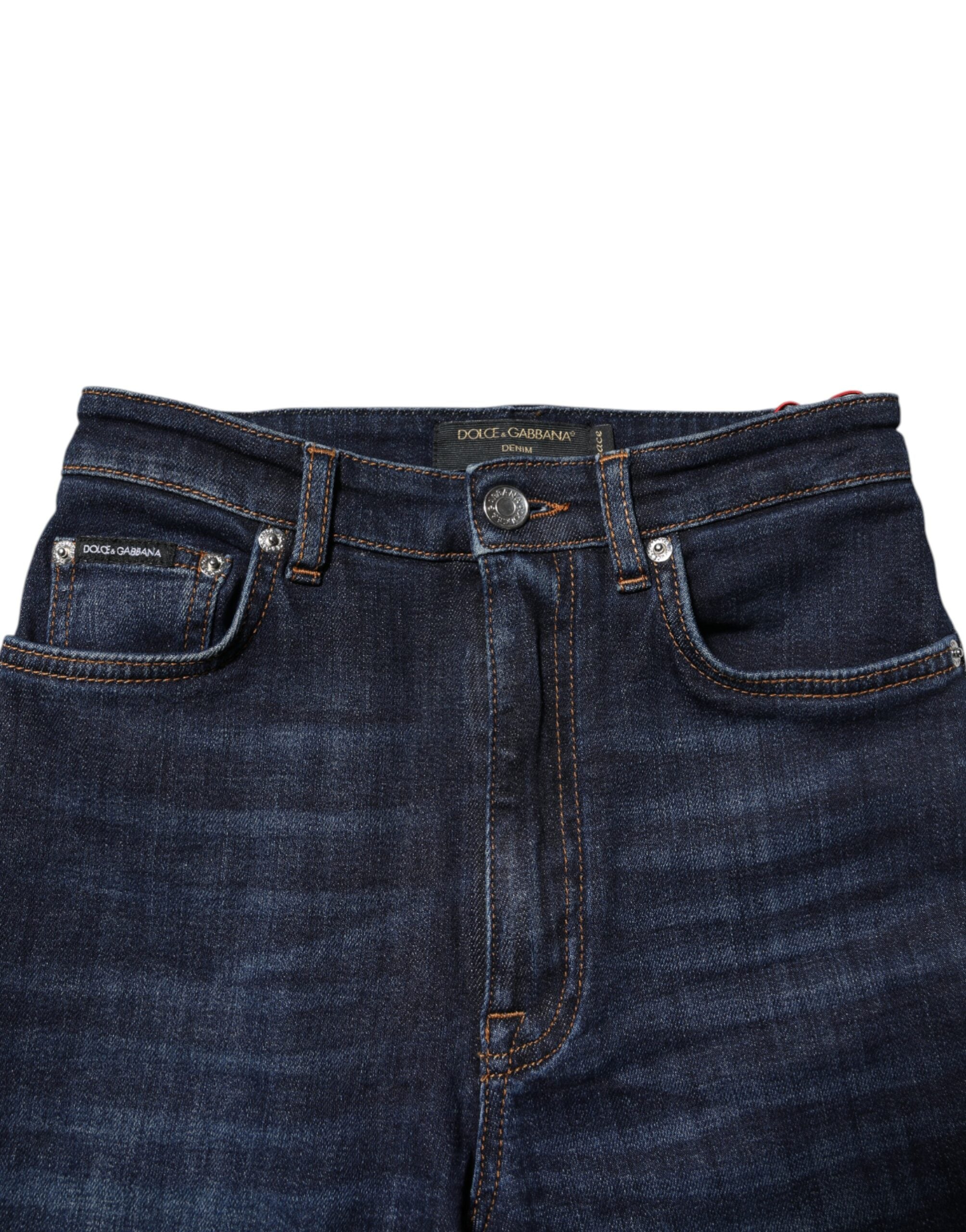 Jeans skinny taille haute en denim bleu Dolce & Gabbana Grace, coupe ajustée, détails modernes, mode élégante et tendance.