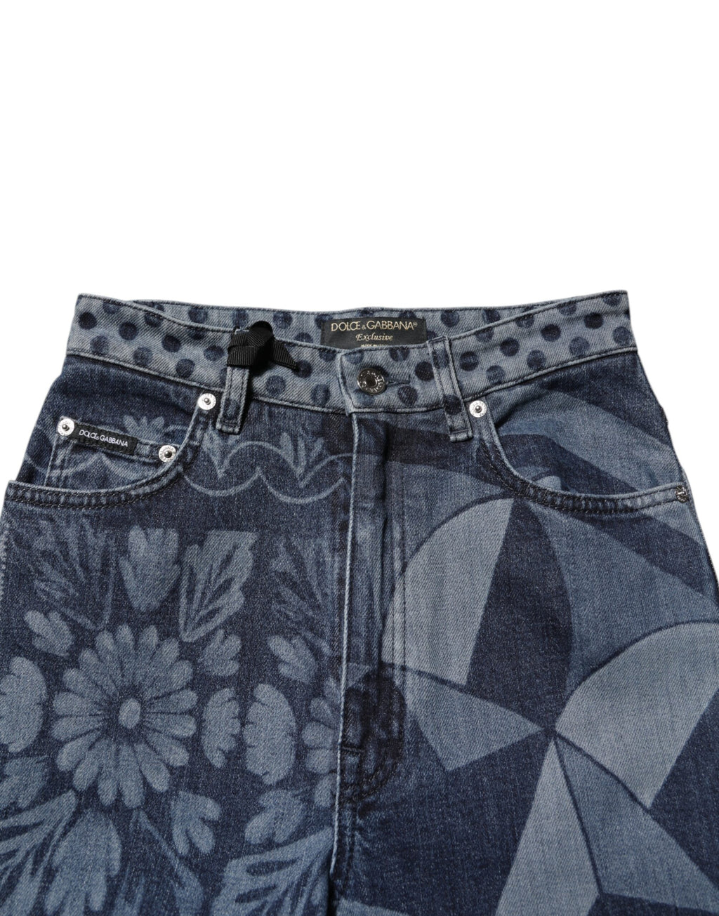 Jeans slim en denim coton bleu à motif graphique Dolce & Gabbana, style moderne et élégant.