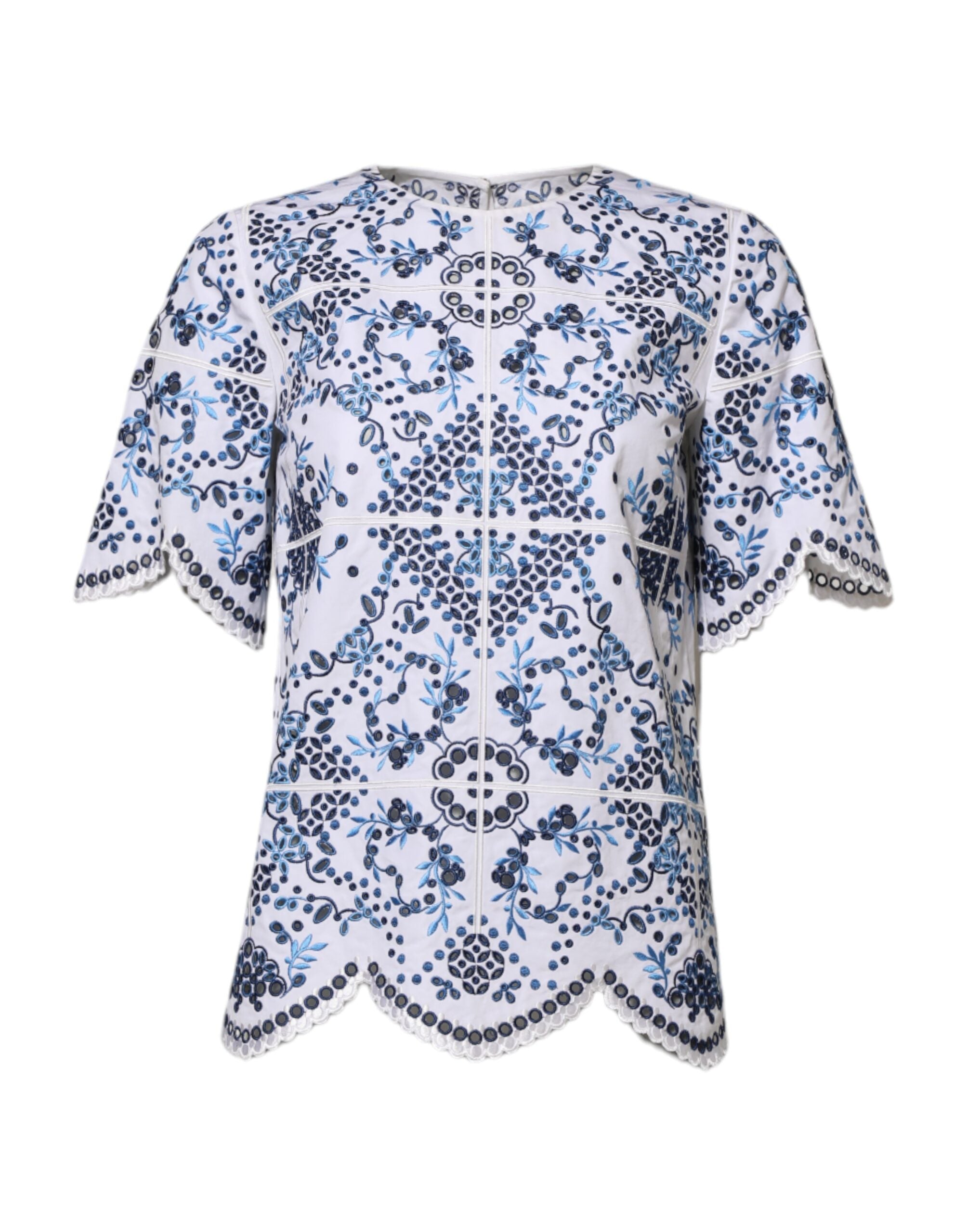 Blouse Dolce & Gabbana en dentelle bleue avec col rond et œillets, vue de face.
