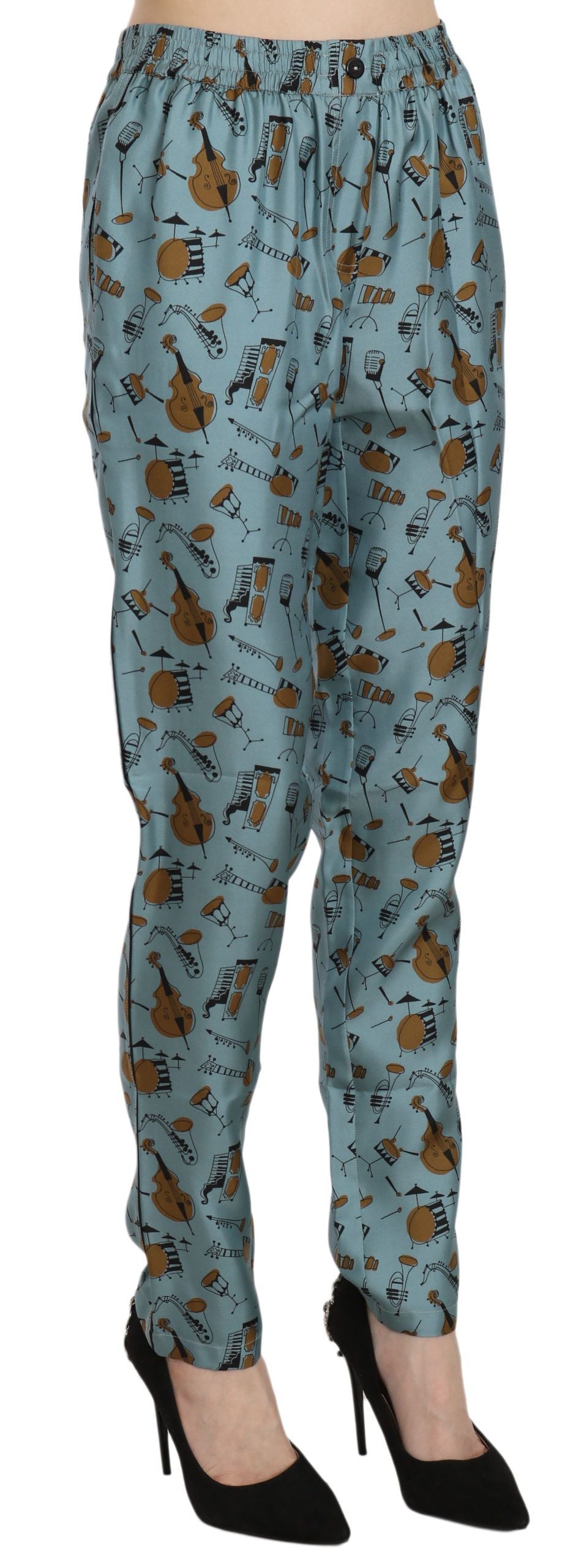 Pantalon fuselé Dolce & Gabbana imprimé instruments de musique bleus, design élégant et mode sophistiquée.