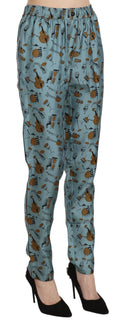 Pantalon fuselé Dolce & Gabbana imprimé instruments de musique bleus, design élégant et mode sophistiquée.