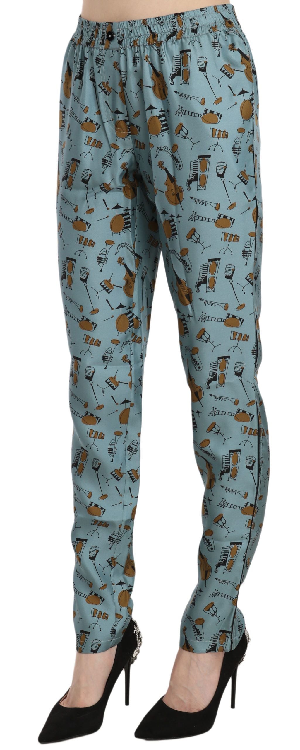 Pantalons fuselés Dolce & Gabbana avec motif d'instruments de musique bleus, tissus léger et design élégant.