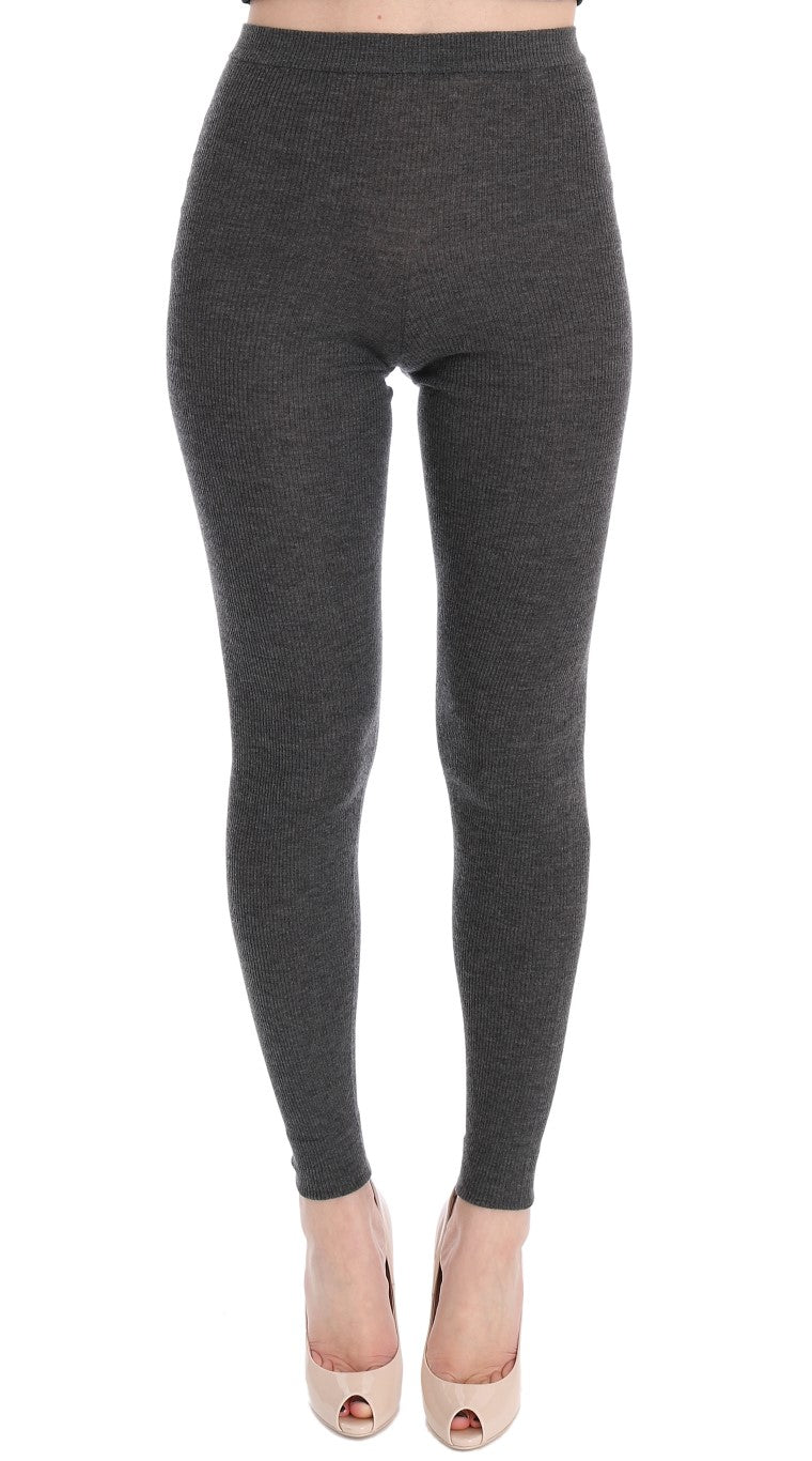 Collants en cachemire gris Dolce & Gabbana, stretch et élégants, visibles avec détails du tissu et de la texture en gros plan.