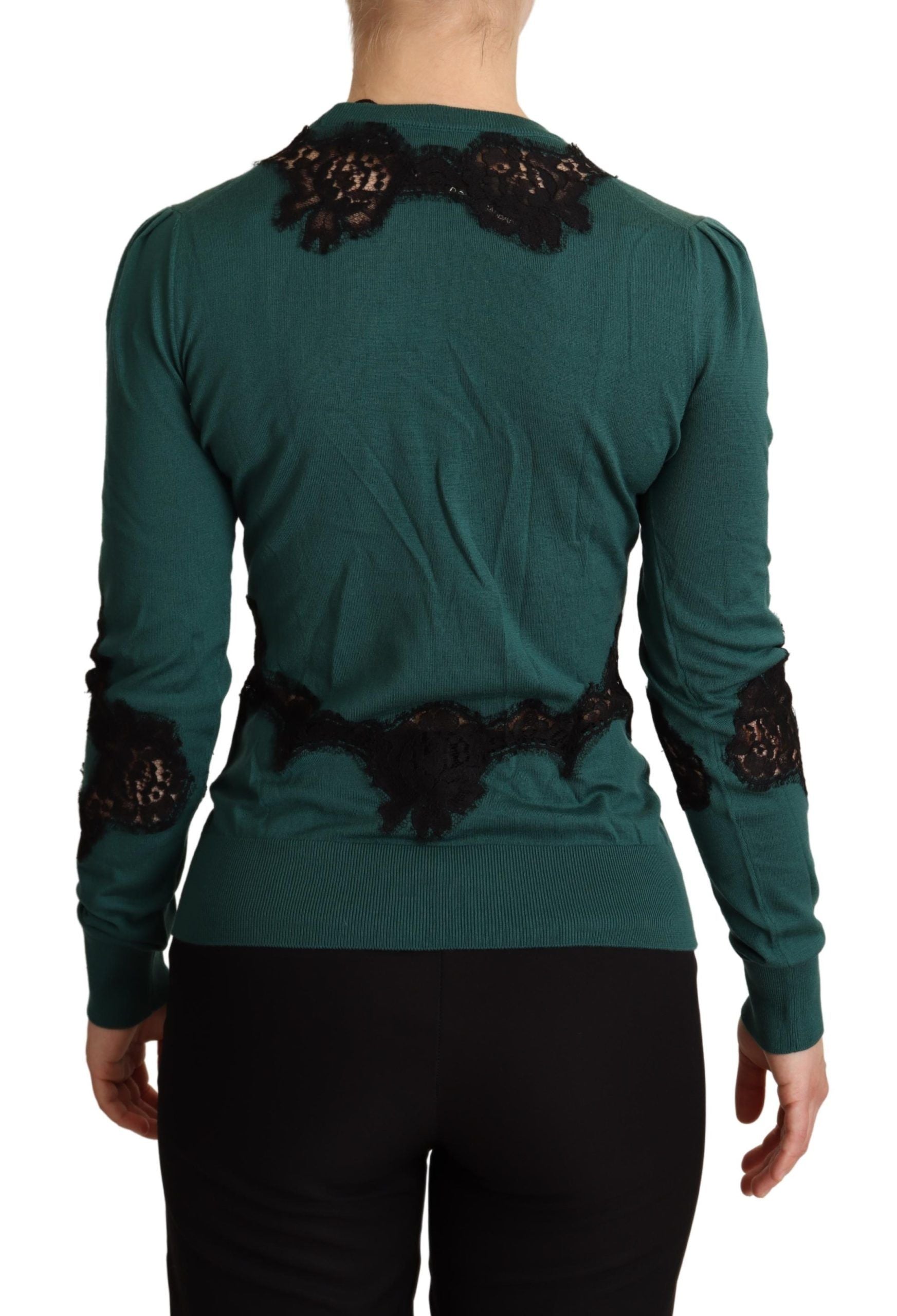 Pull en laine verte Dolce & Gabbana avec col rond, visible sur l'image.