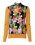 Polo Dolce & Gabbana à manches longues avec motif floral multicolore, style élégant et coloré.
