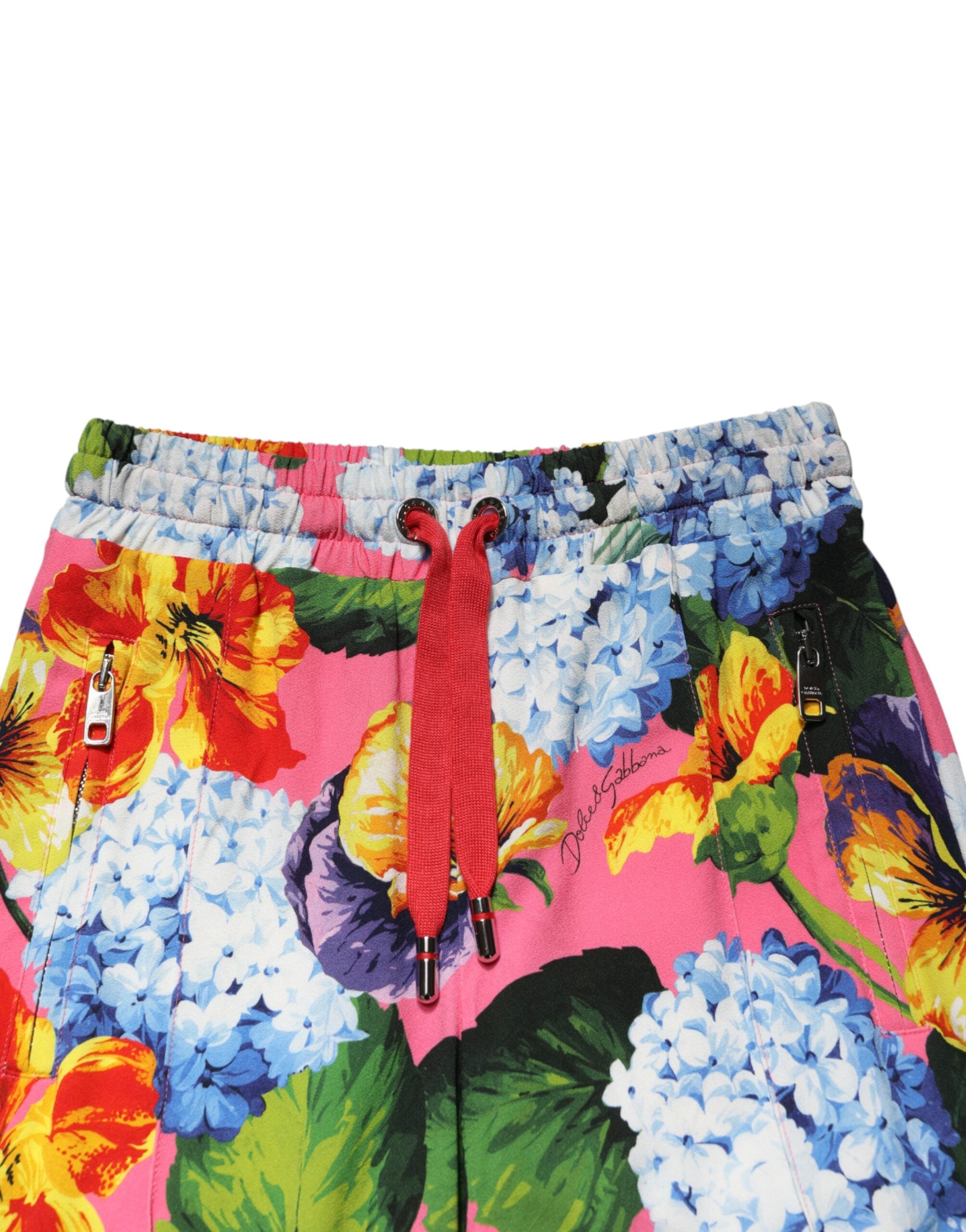 Pantalons joggers Dolce & Gabbana à taille moyenne avec motif floral multicolore, tissu léger et coupe décontractée.
