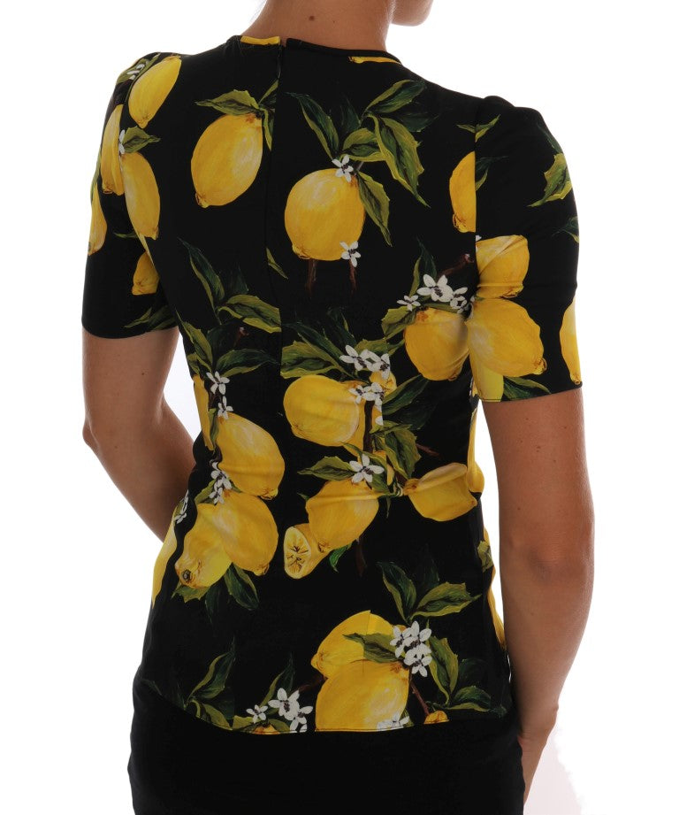T-shirt en soie multicolore citron Dolce & Gabbana, stretch, avec motif floral vibrant, porté sur mannequin.