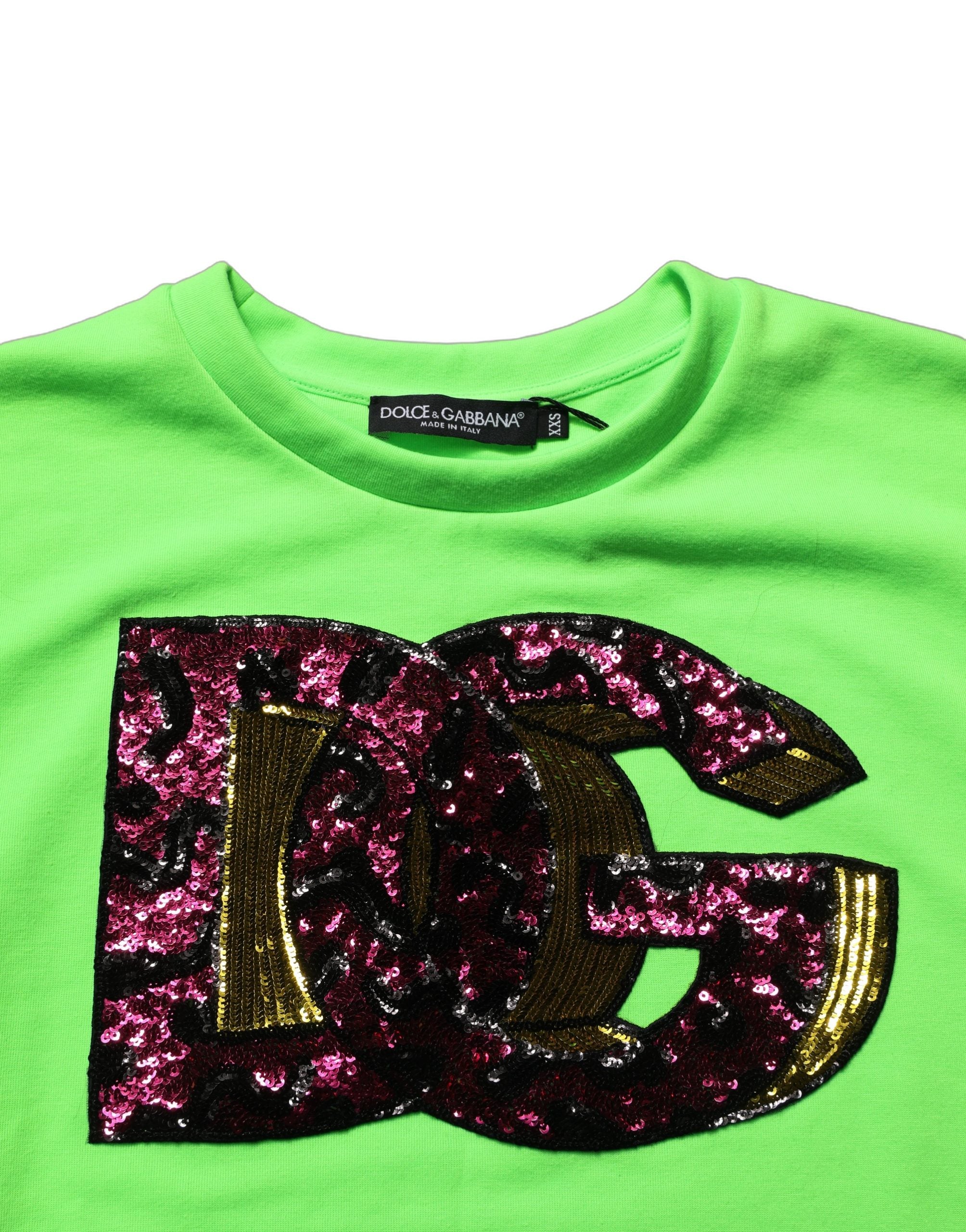 Top sans manches en jersey vert néon avec sequins de Dolce & Gabbana, ajusté, sans manches, pour un look élégant et moderne.
