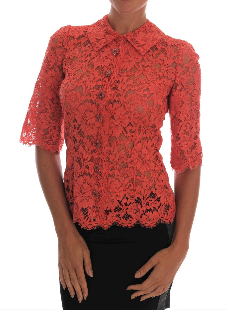 Blouse en dentelle florale Dolce & Gabbana avec boutons en cristal orange, élégante et raffinée.