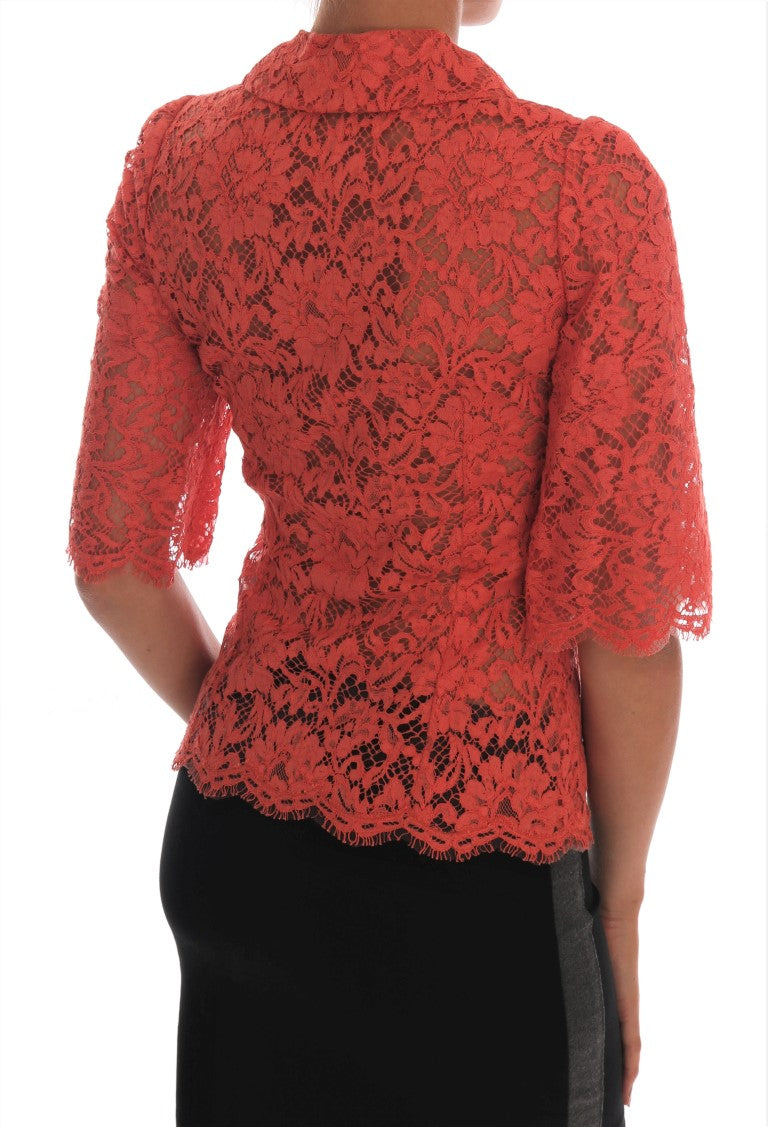 Chemisier en dentelle florale Dolce & Gabbana avec boutons en cristal orange, détail élégant et féminin.