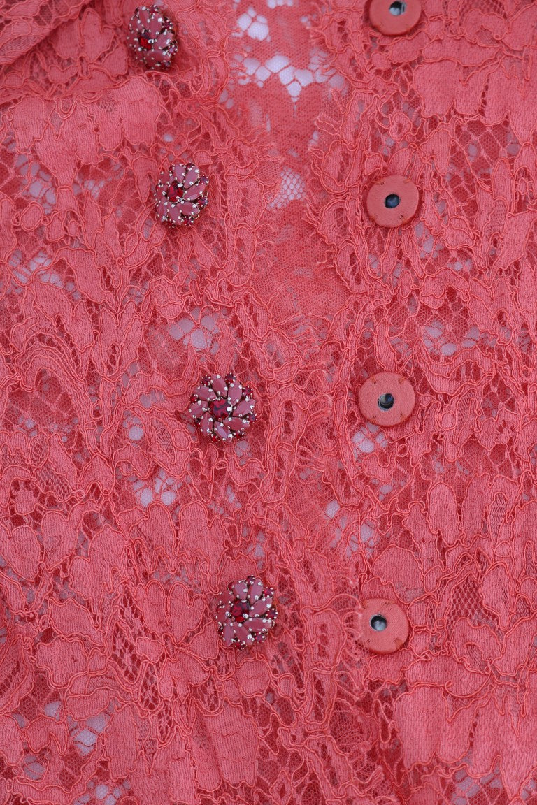 Blouse en dentelle florale Dolce & Gabbana avec boutons en cristal orange, détails élégants et look sophistiqué.