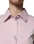 Chemise longue en coton rose Dolce & Gabbana avec col, manches longues et coupe élégante, vue de face.