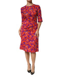 Robe midi Dolce & Gabbana en soie violette avec imprimé floral, coupe ajustée et élégante, vue de face.
