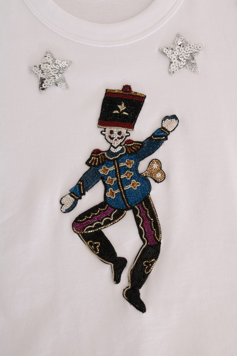T-shirt blanc en coton Dolce & Gabbana avec motif féerique et détails graphiques, style élégant et décontracté.