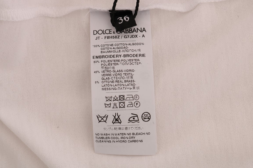 T-shirt blanc en coton Dolce & Gabbana avec motif conte de fées, design élégant et confortable, vue de face.