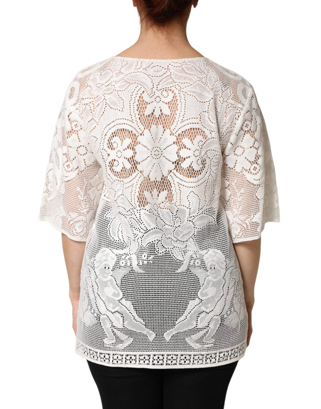 Blouse en coton blanc avec broderie en dentelle Dolce & Gabbana, haut féminin élégant et délicat.